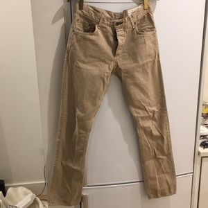 Cream colored slim straight jeans
